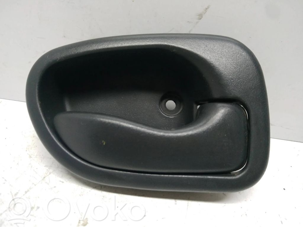 Hyundai Accent Front door interior handle 
