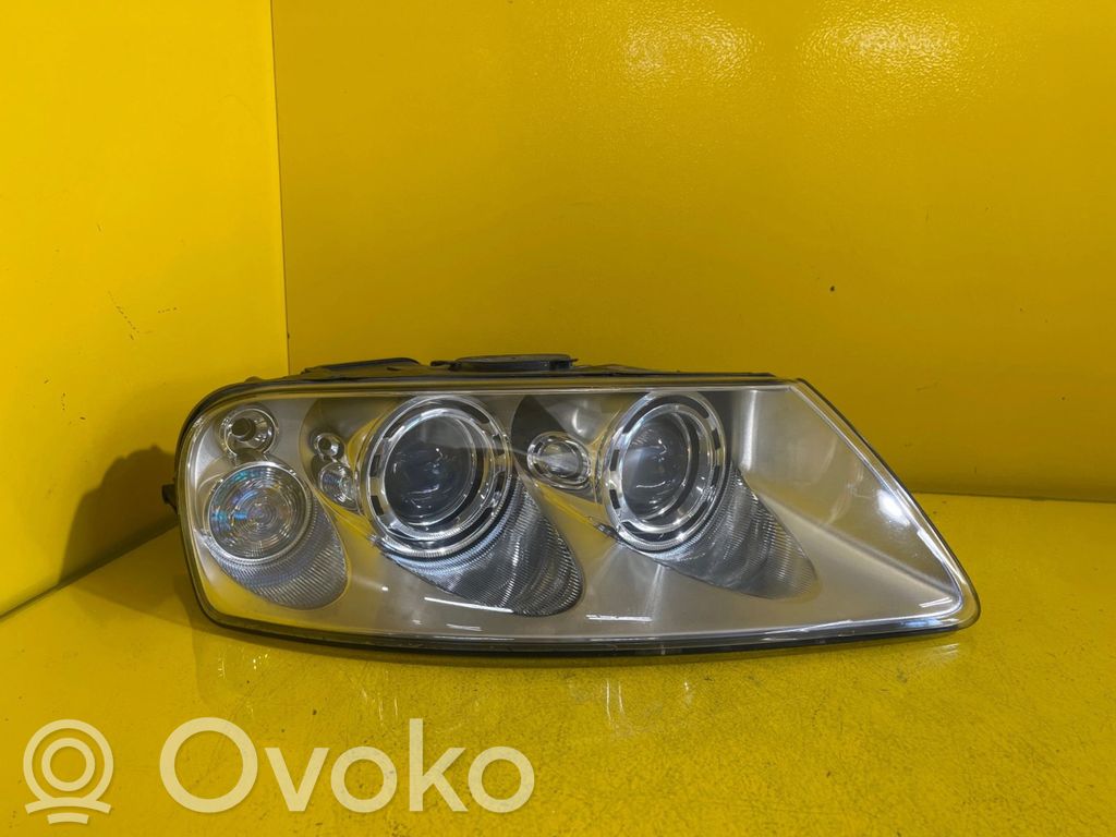 Volkswagen Touareg I Lampa przednia 