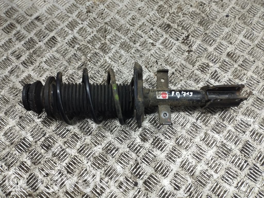 Front shock absorber with coil spring