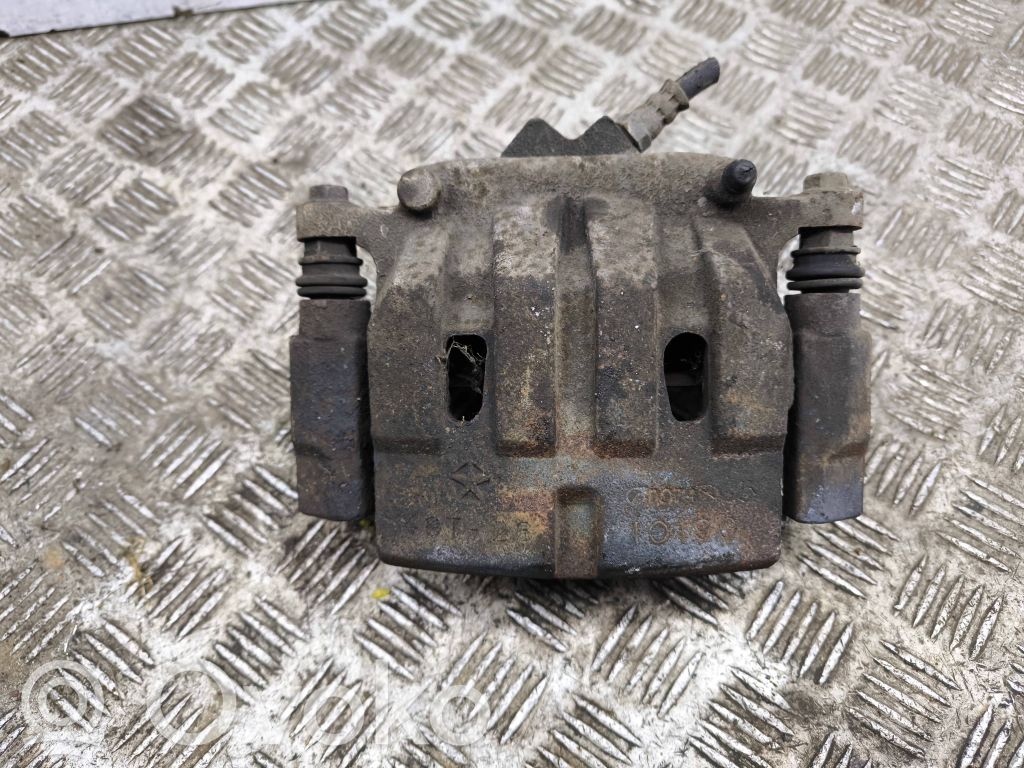 Caliper de freno delantero