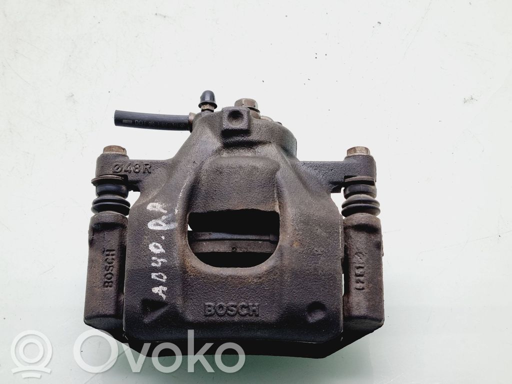 Toyota Aygo AB40 Zacisk hamulcowy przedni 