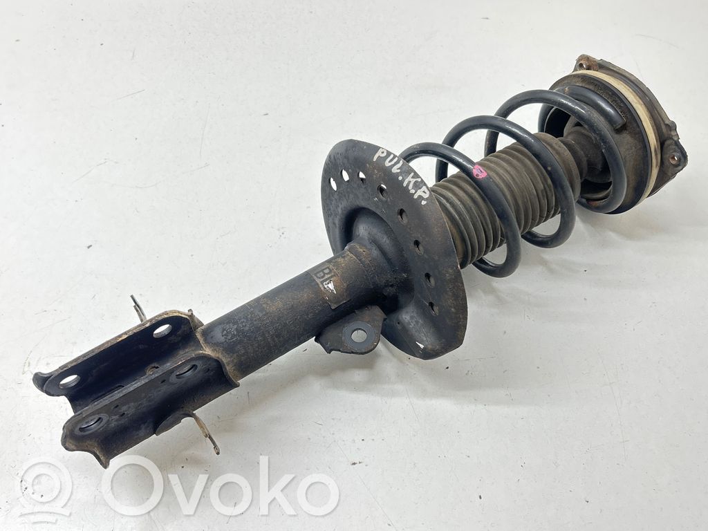 Nissan Pulsar Front shock absorber with coil spring 