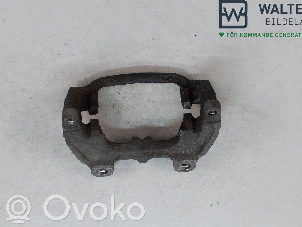 Volkswagen Caddy Mocowanie przedniego zacisku hamulca 