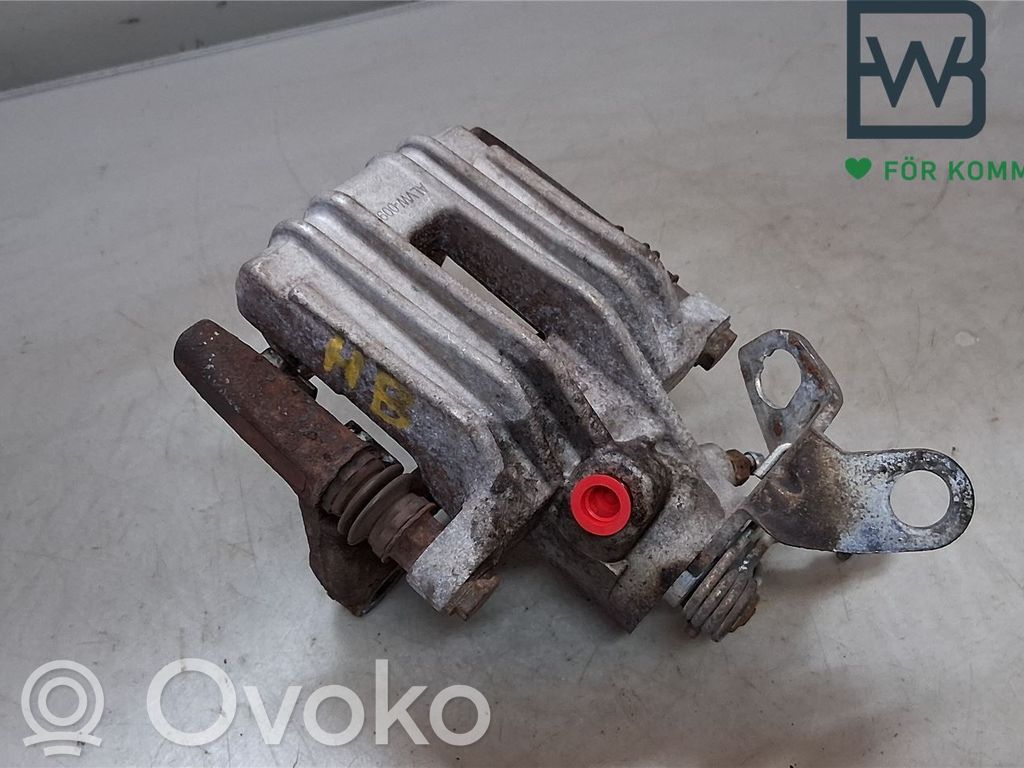 Volkswagen Golf VI Tylny zacisk hamulcowy 