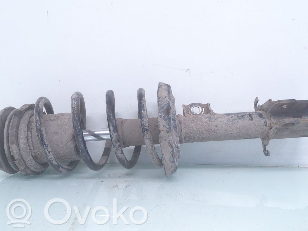Front shock absorber with coil spring