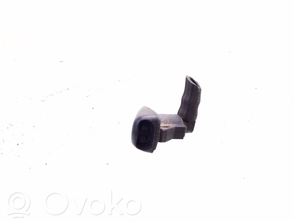 Windshield washer spray nozzle