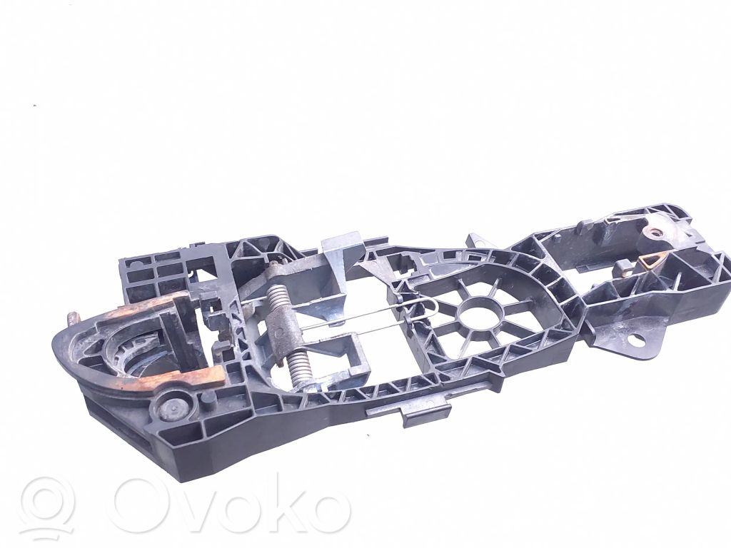 Volkswagen PASSAT B6 Etuoven ulkokahvan kehys 
