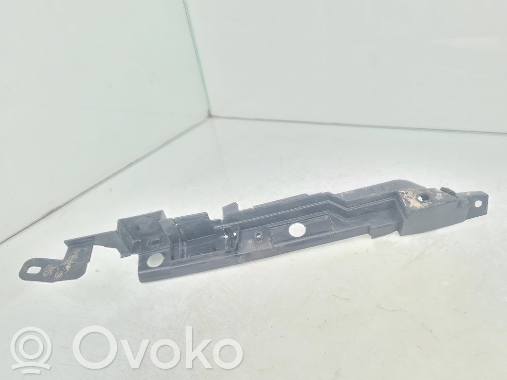 Opel Corsa D Uchwyt / Mocowanie lampy przedniej 