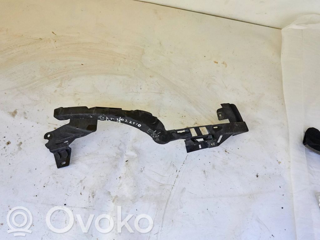Opel Zafira C Uchwyt / Mocowanie lampy przedniej 