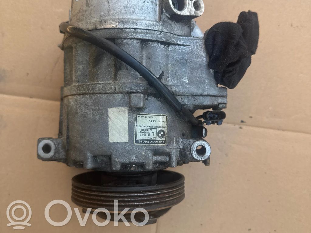 BMW X5 E70 Uchwyt / Mocowanie sprężarki klimatyzacji 