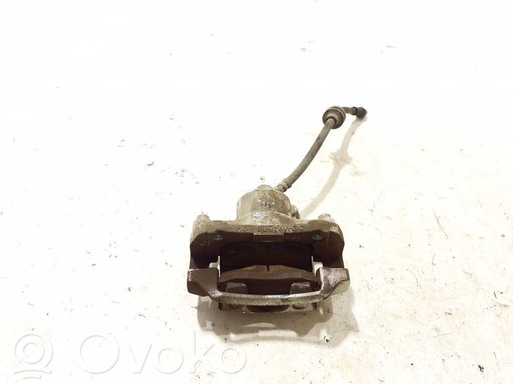 Dacia Spring Передний суппорт 