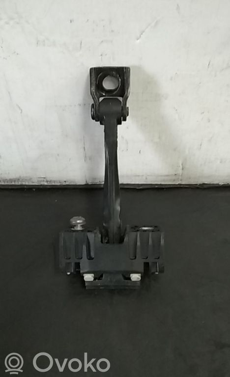 Front door check strap stopper   7070333