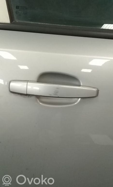 Opel Astra H Front door exterior handle 