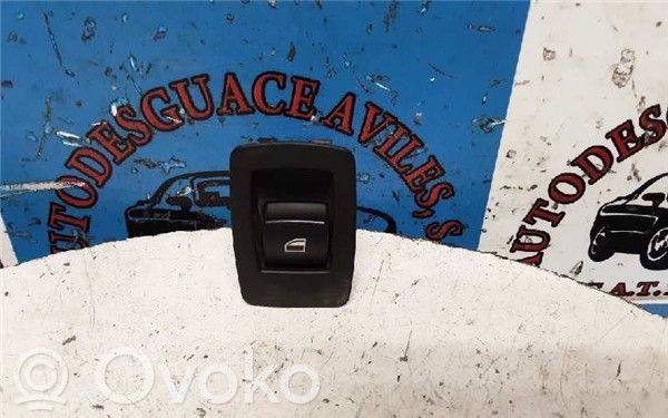 Electric window control switch   6945874,15939900