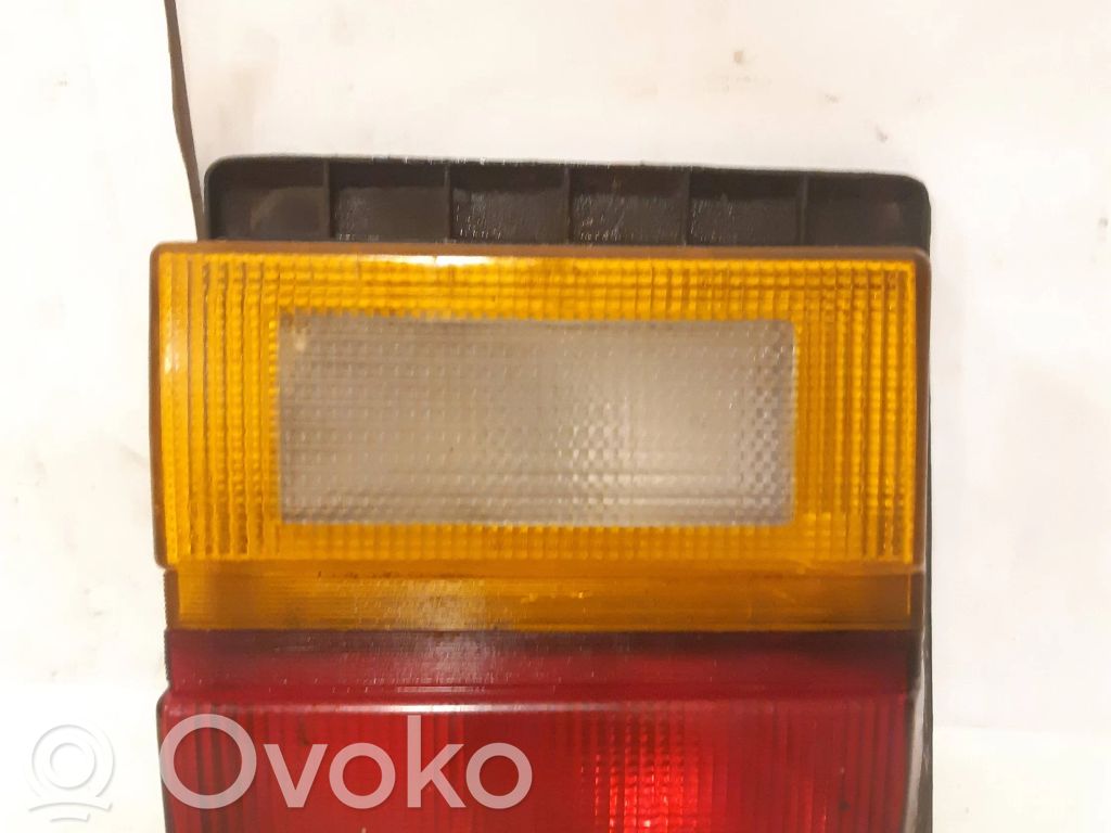 Audi 100 200 5000 C3 Aizmugurējais lukturis pārsegā 