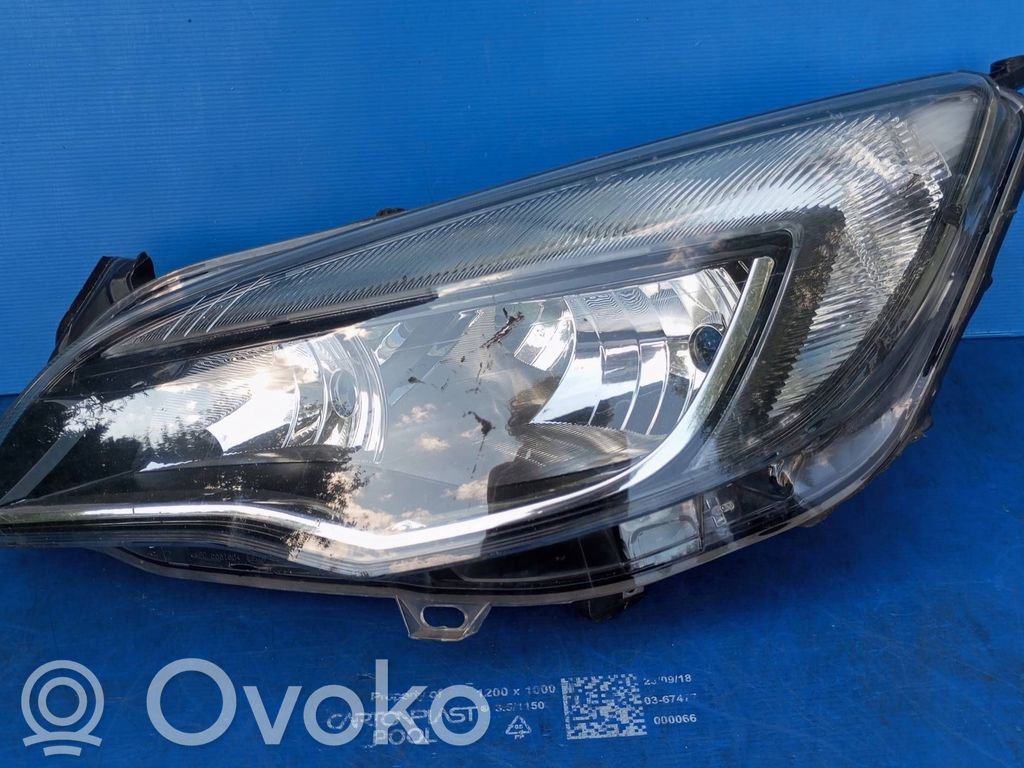 Opel Astra J Lampa przednia 