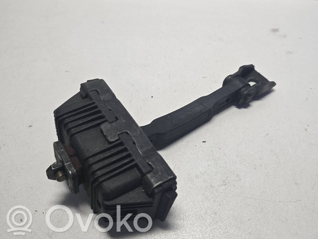Front door check strap stopper   8402502