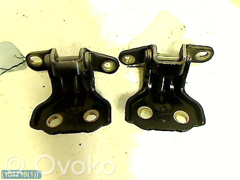 Rear door upper hinge