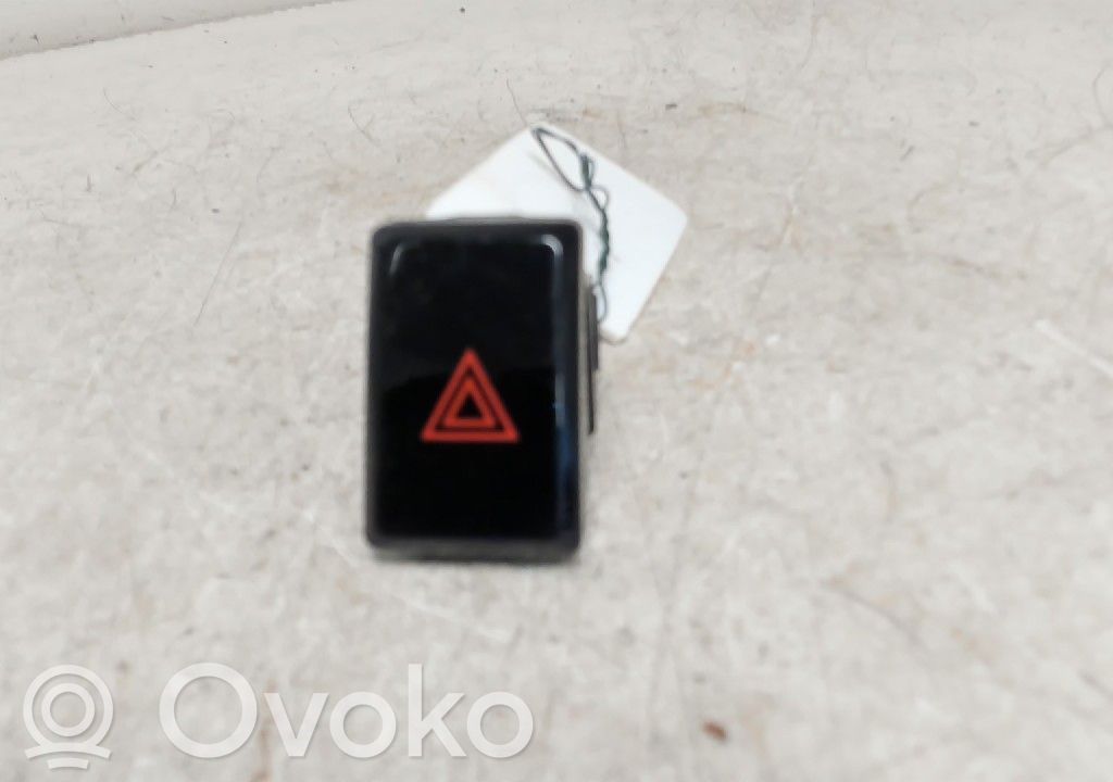 Botón interruptor de luz de peligro   83037AL010