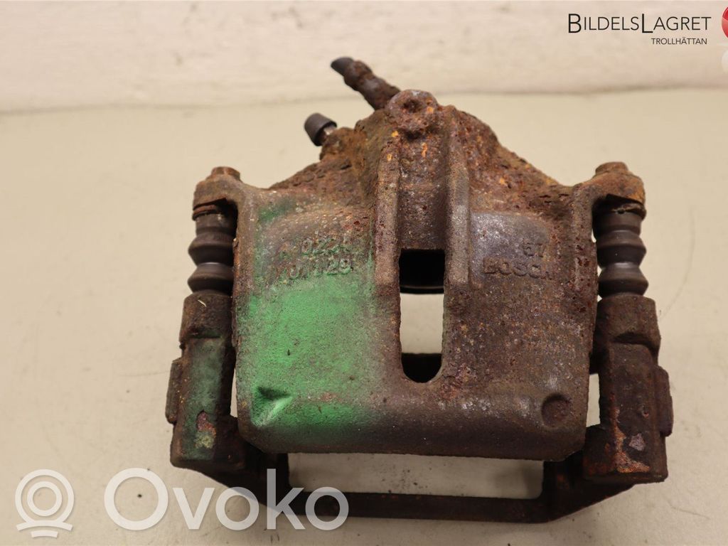 Ford Mondeo Mk III Zacisk hamulcowy przedni 