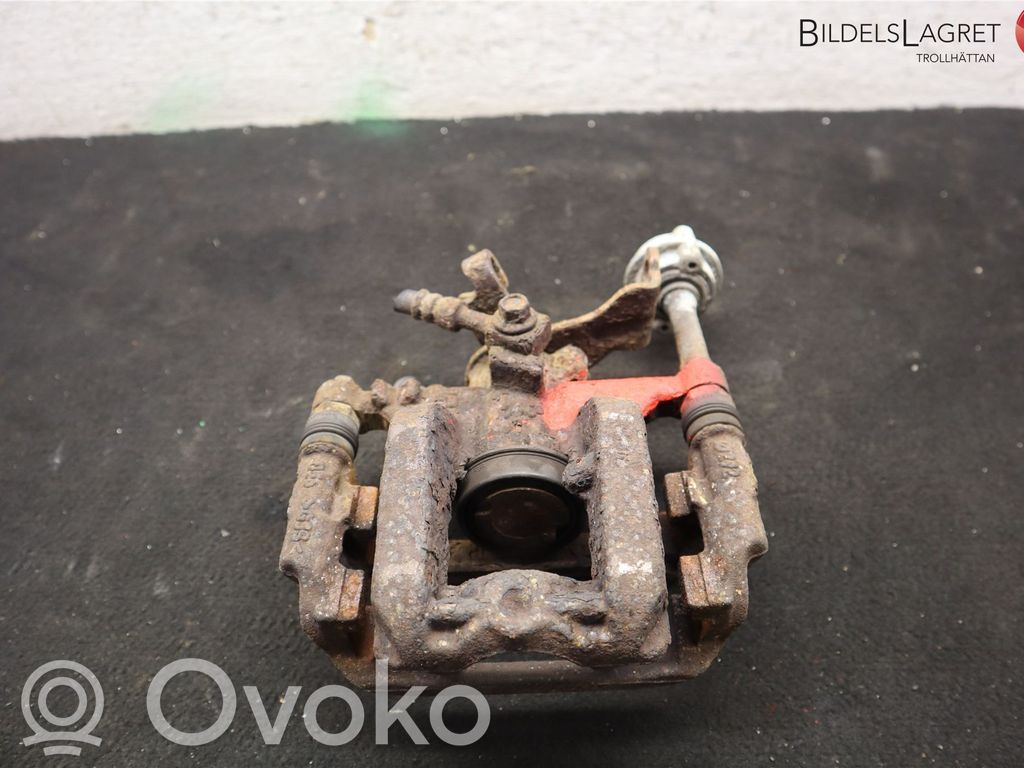 Opel Astra J Tylny zacisk hamulcowy 