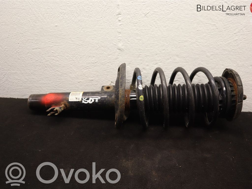 Peugeot 208 I Front shock absorber with coil spring 