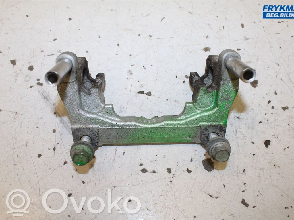 Ford Focus Plaquette / support d'étrier avant 