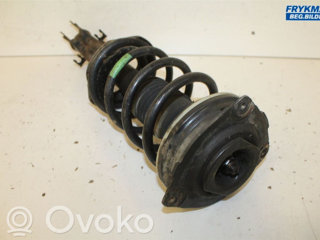 Nissan NV200 Front shock absorber with coil spring 