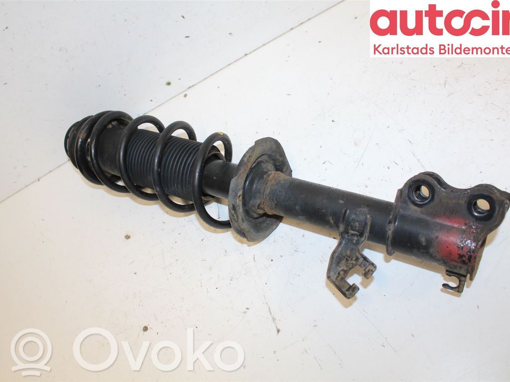 Front shock absorber with coil spring