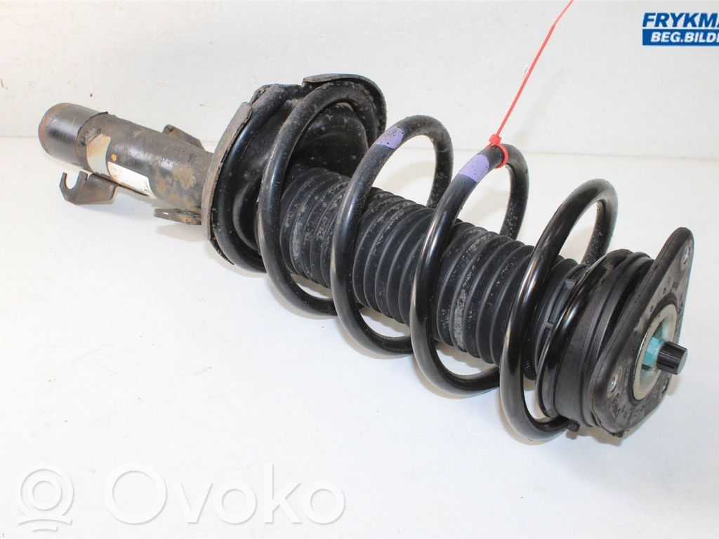 Mazda 3 II Front shock absorber with coil spring 