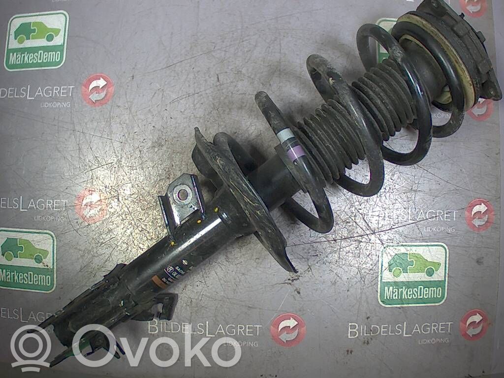 Nissan Qashqai+2 Amortyzator osi przedniej ze sprężyną 