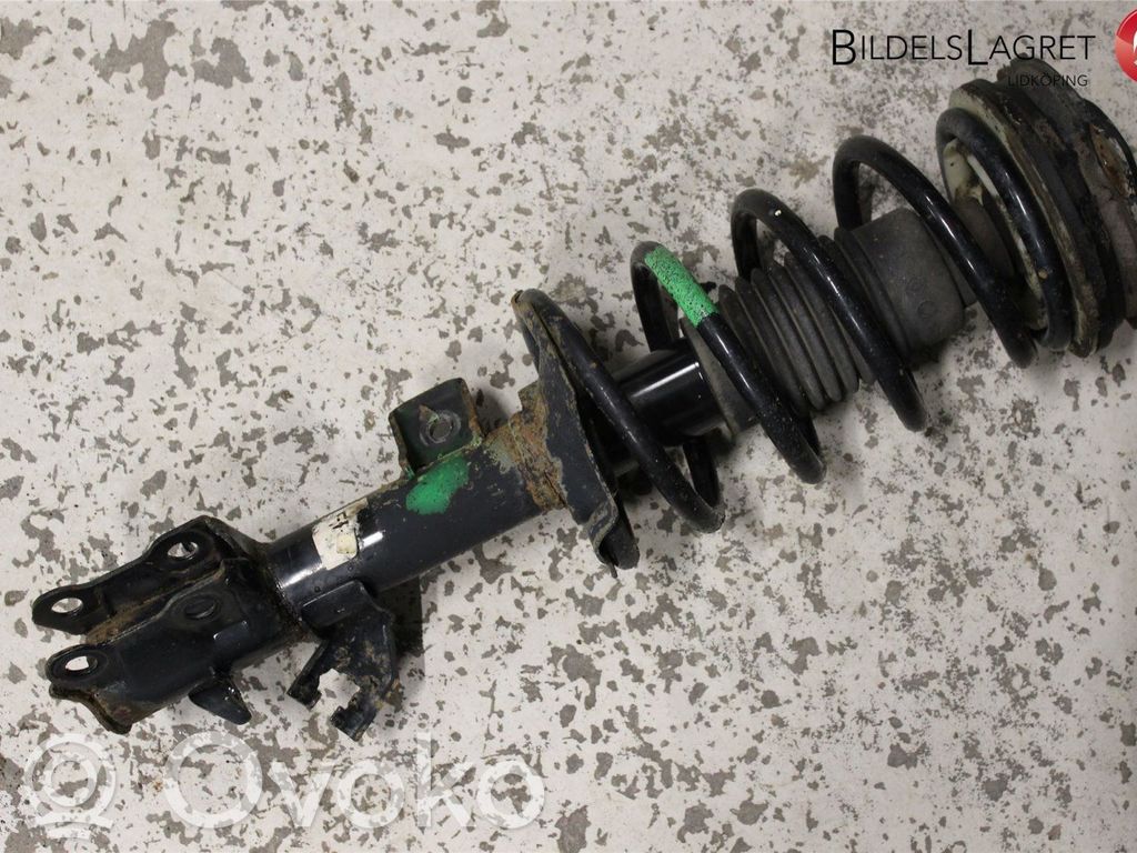 Nissan NV200 Front shock absorber with coil spring 