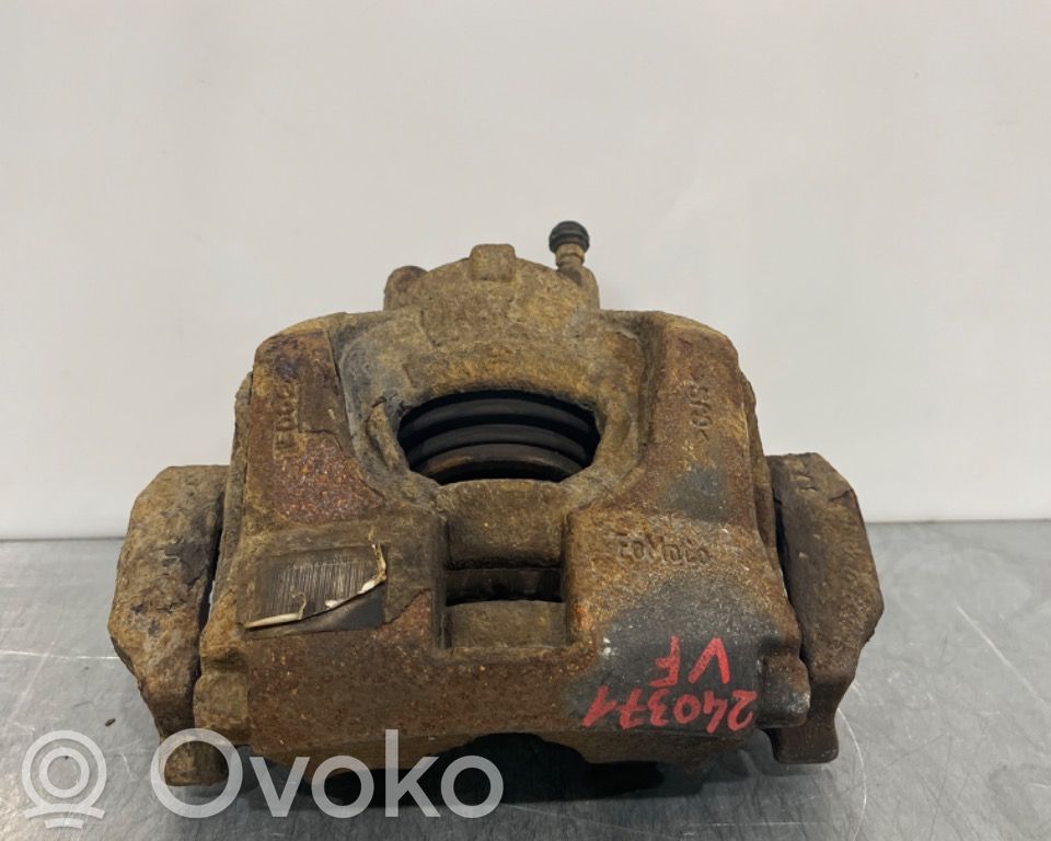 Ford Mondeo MK V Zacisk hamulcowy przedni 