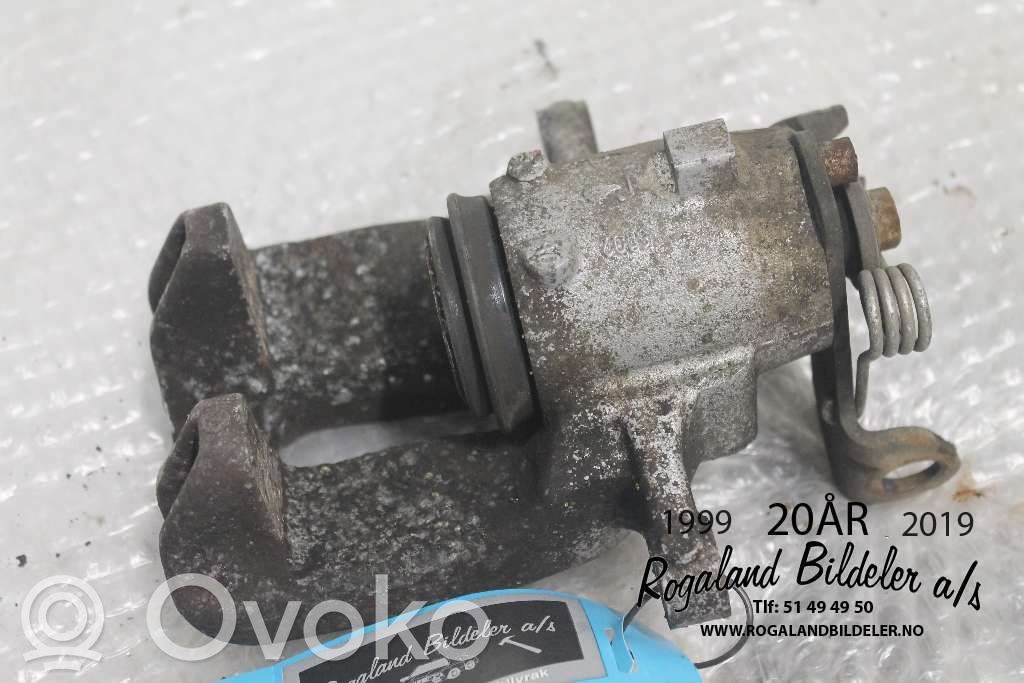 Opel Insignia A Tylny zacisk hamulcowy 