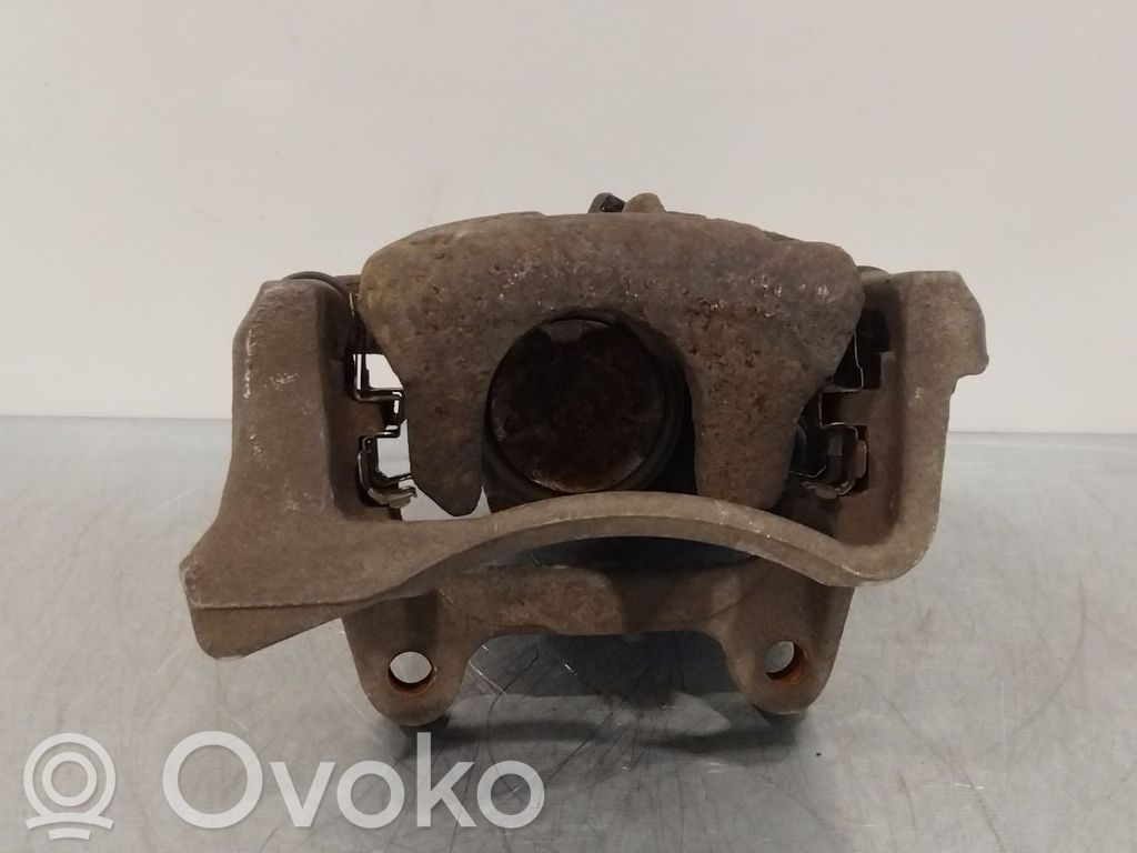 Volkswagen PASSAT B7 Tylny zacisk hamulcowy 