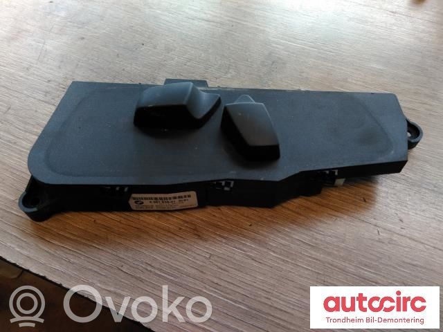 BMW X5 E70 Front door window switch trim 