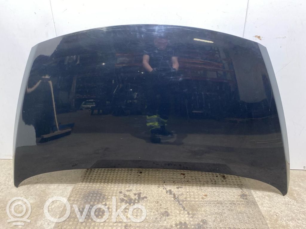 KIA Carens III Konepelti 