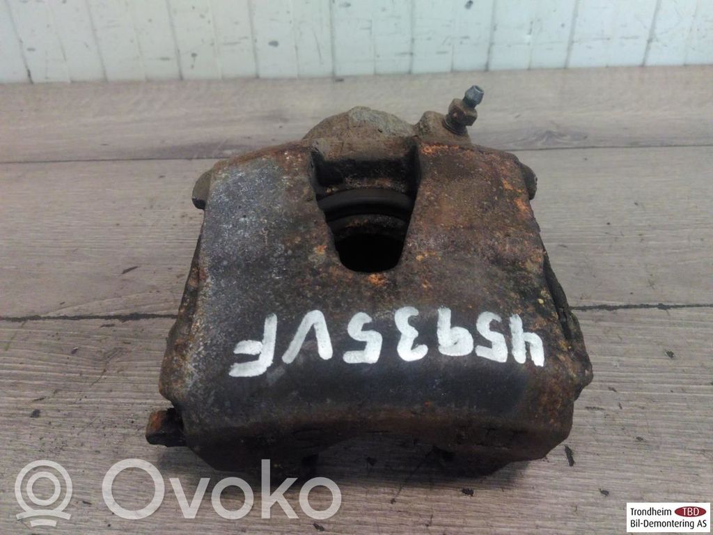Volkswagen Golf VI Zacisk hamulcowy przedni 