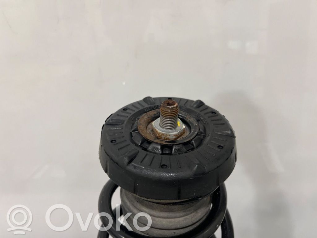 Opel Astra J Amortiguador delantero con muelle espiral