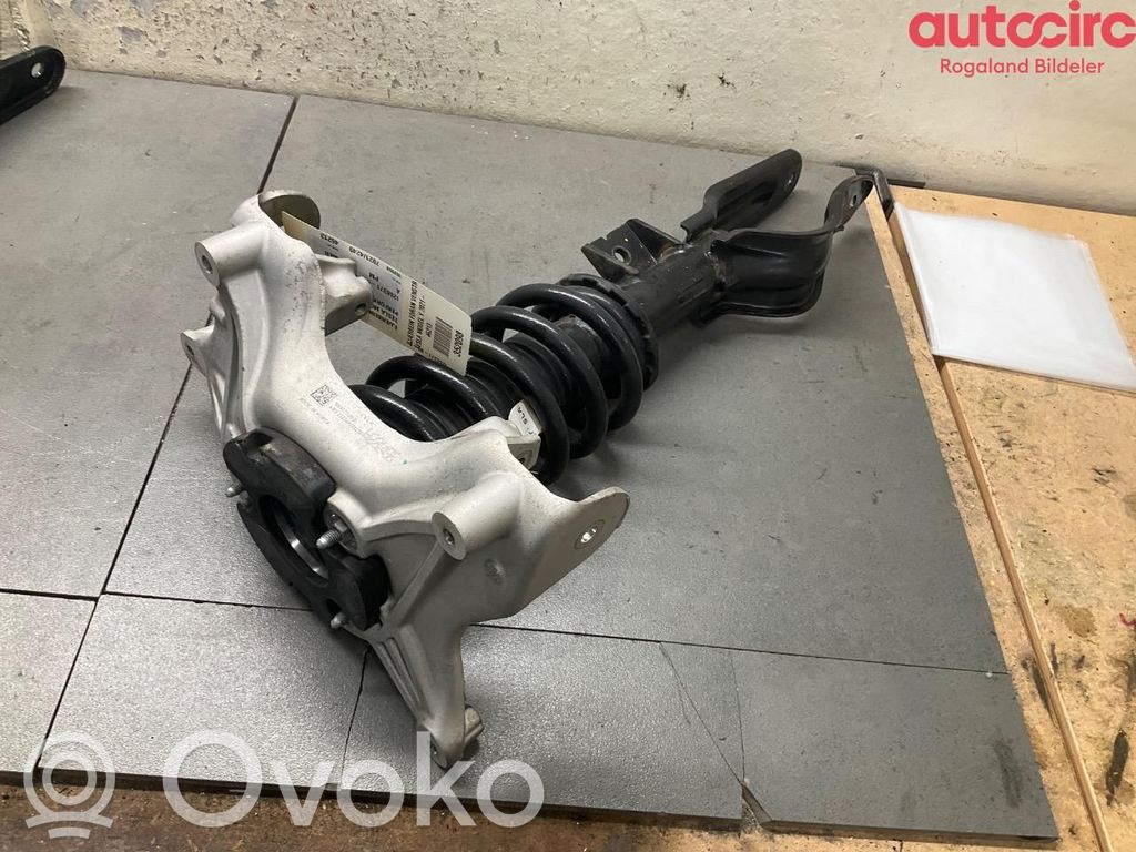 Tesla Model Y Etuiskunvaimennin kierrejousella 
