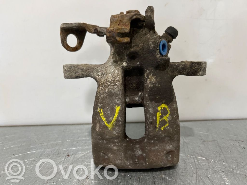 Opel Astra G Tylny zacisk hamulcowy 