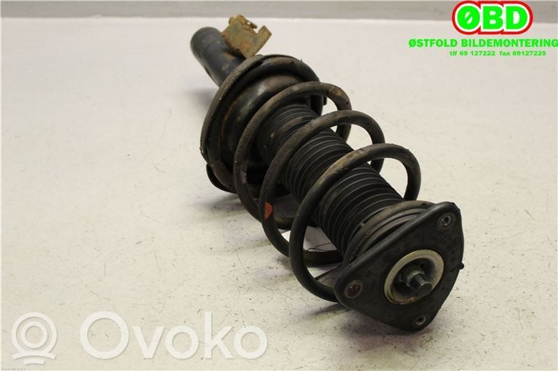 Mazda 3 II Front shock absorber with coil spring 