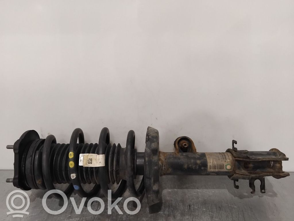 Opel Combo D Amortyzator osi przedniej ze sprężyną 
