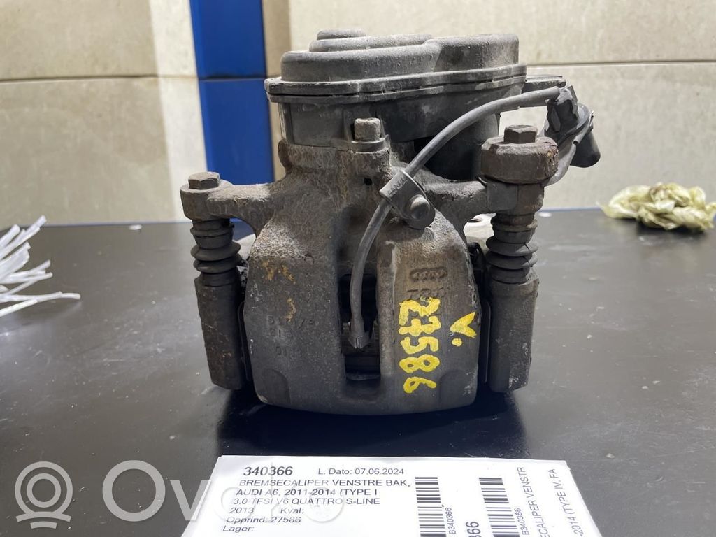 Audi A6 S6 C7 4G Tylny zacisk hamulcowy 