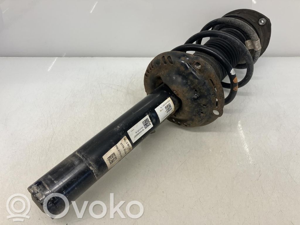 Volkswagen Golf VIII Amortyzator osi przedniej ze sprężyną 