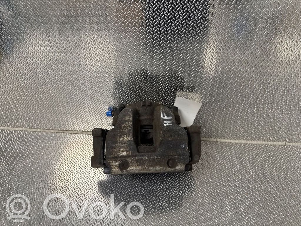 Volvo V60 Zacisk hamulcowy przedni 