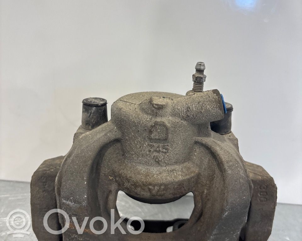 Ford Mondeo MK IV Zacisk hamulcowy przedni 