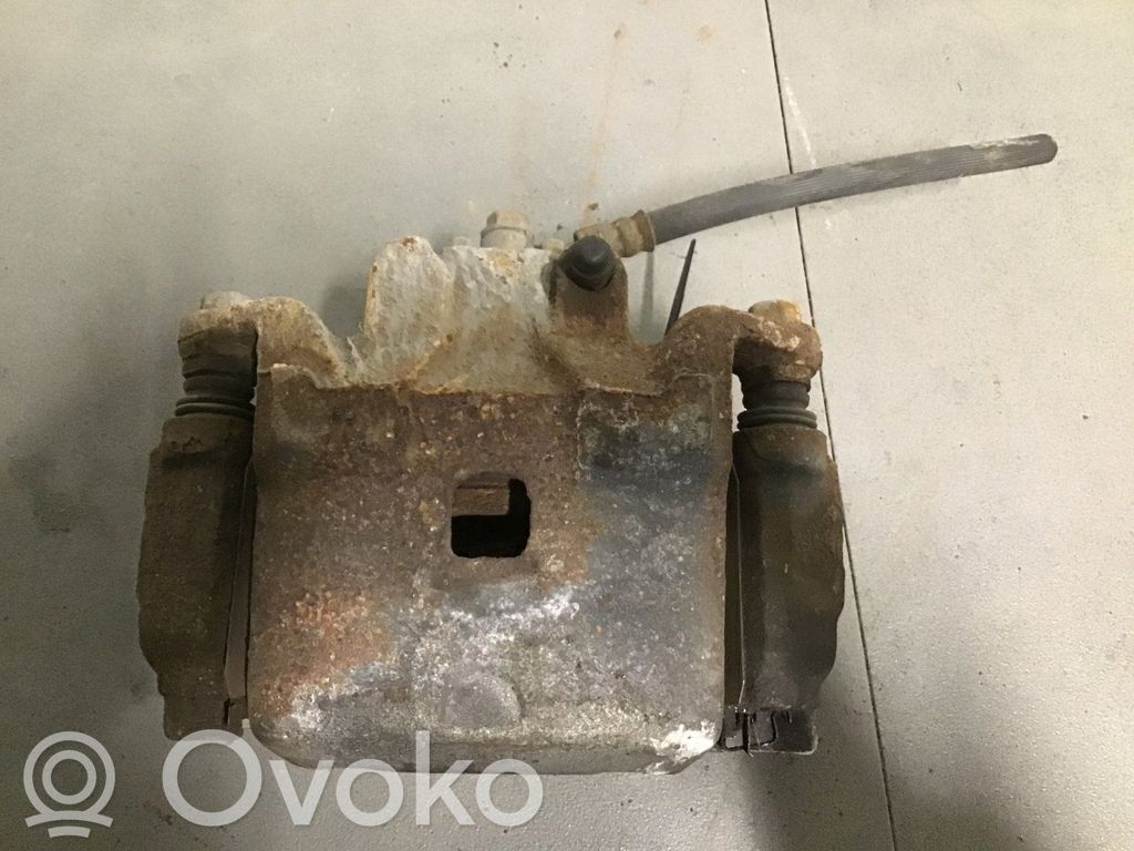 Nissan Leaf I (ZE0) Front brake caliper 