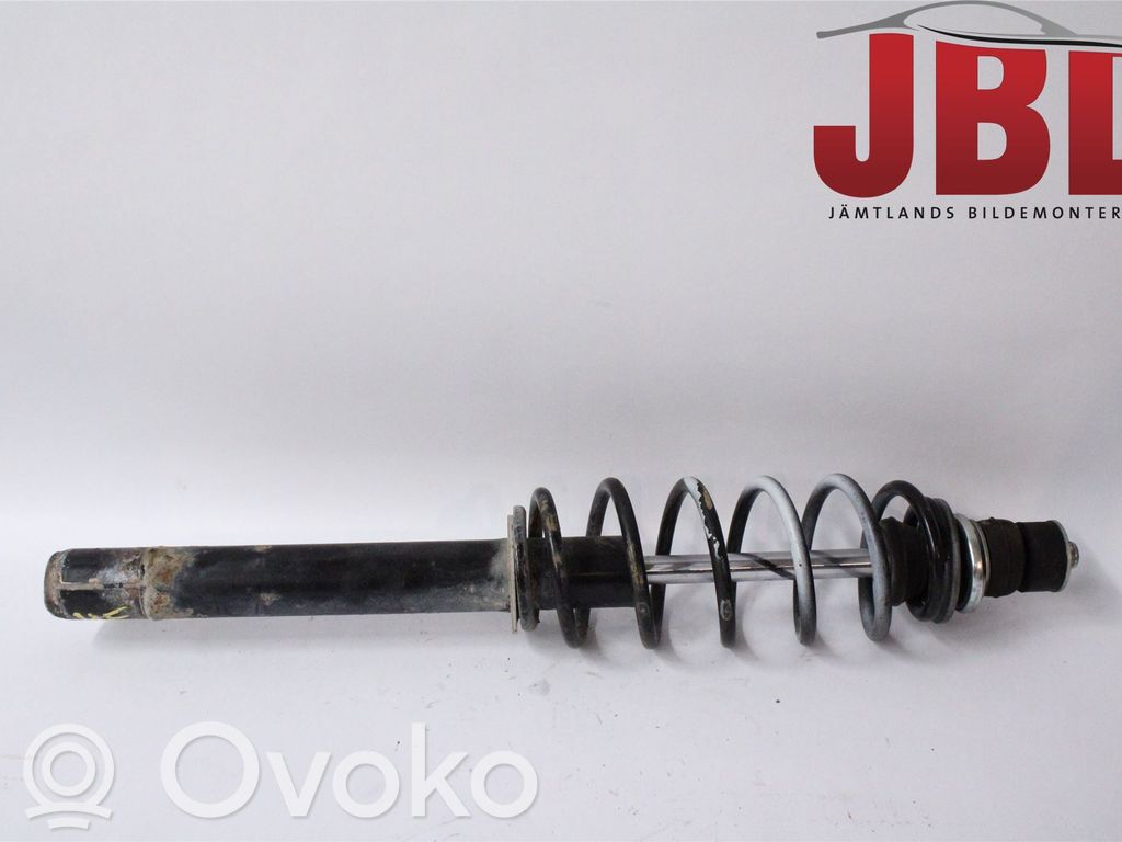Front shock absorber with coil spring