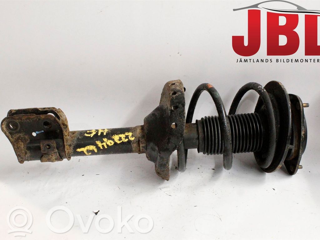 Subaru Legacy Front shock absorber with coil spring 